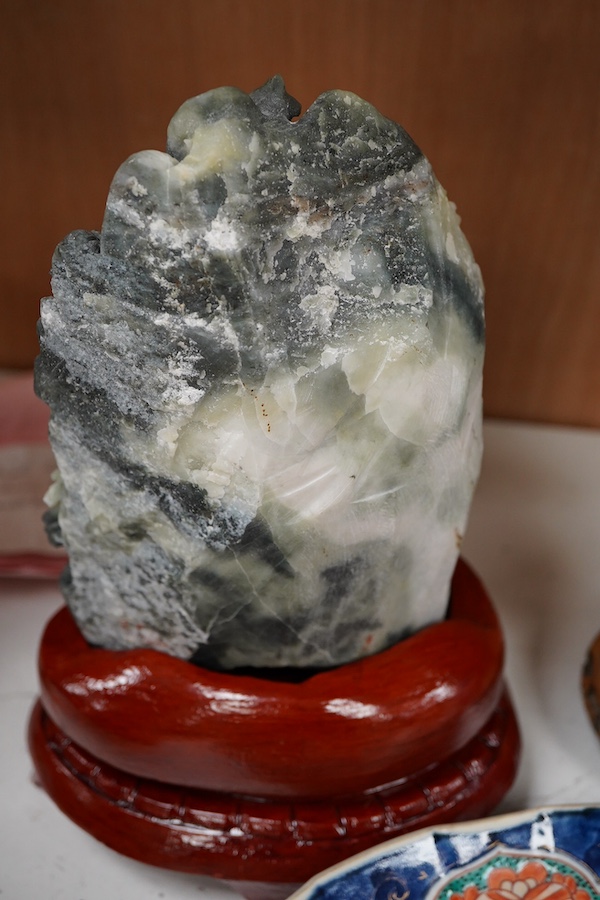 A Japanese Imari dish an Arita bottle vase together with a Chinese cloisonné enamel vase and a Chinese hardstone boulder carving, largest 34cm in diameter